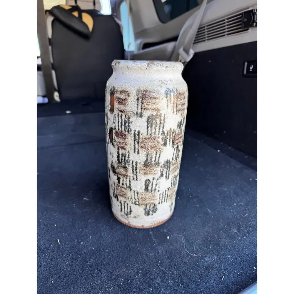 Hand-thrown studio pottery vase textured impasto glaze earthy palette signed